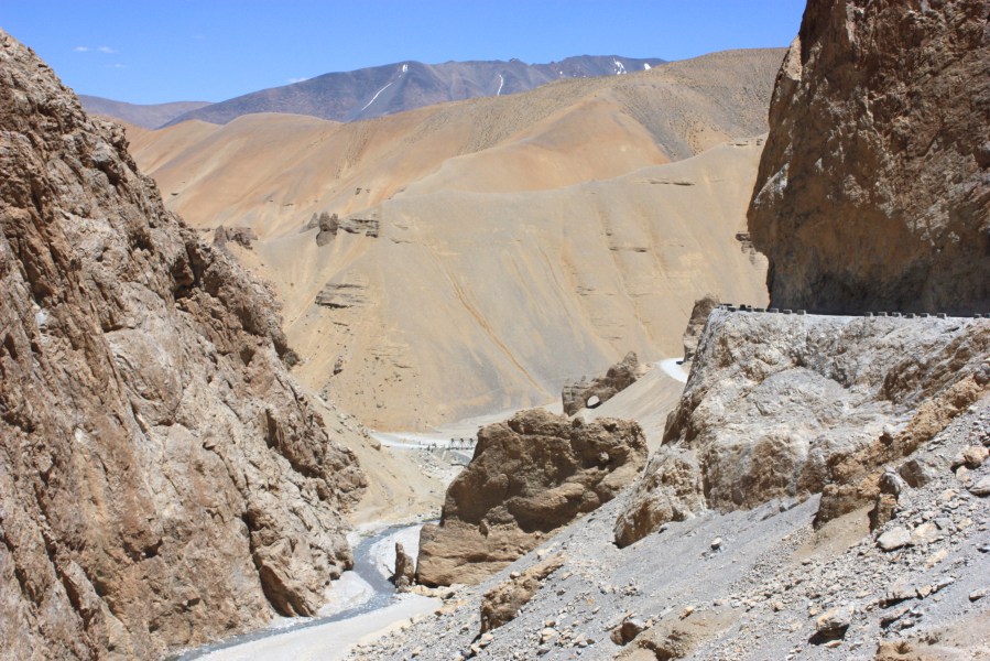 Rocky mountain terrain to sandy desert